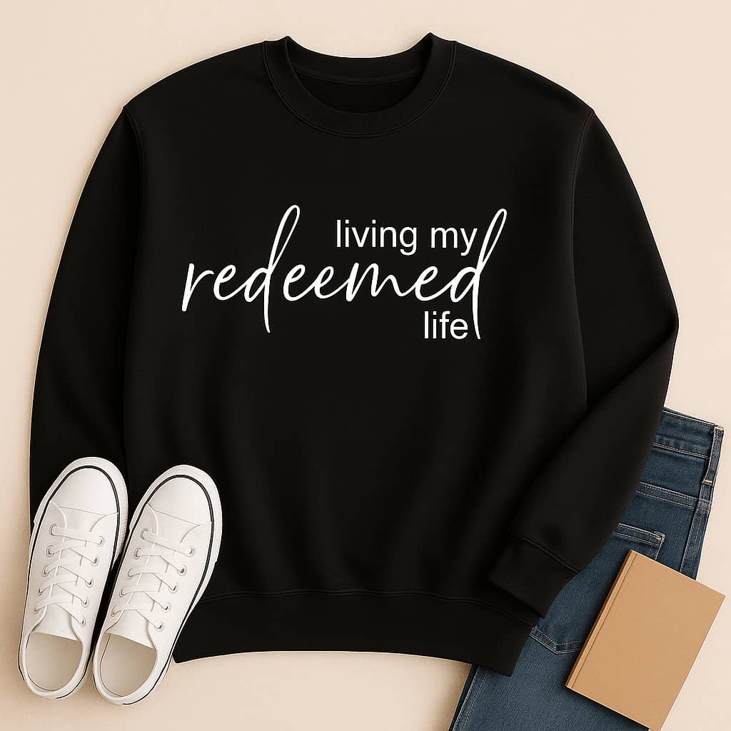 “Living My Redeemed Life” Christian Sweatshirt – Faith-Inspired Comfort & Everyday Encouragement
