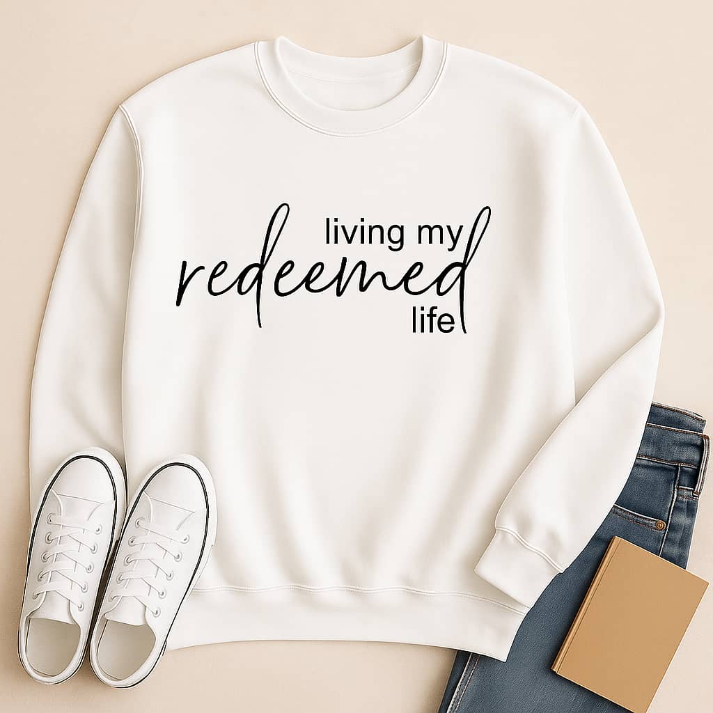 “Living My Redeemed Life” Christian Sweatshirt – Faith-Inspired Comfort & Everyday Encouragement