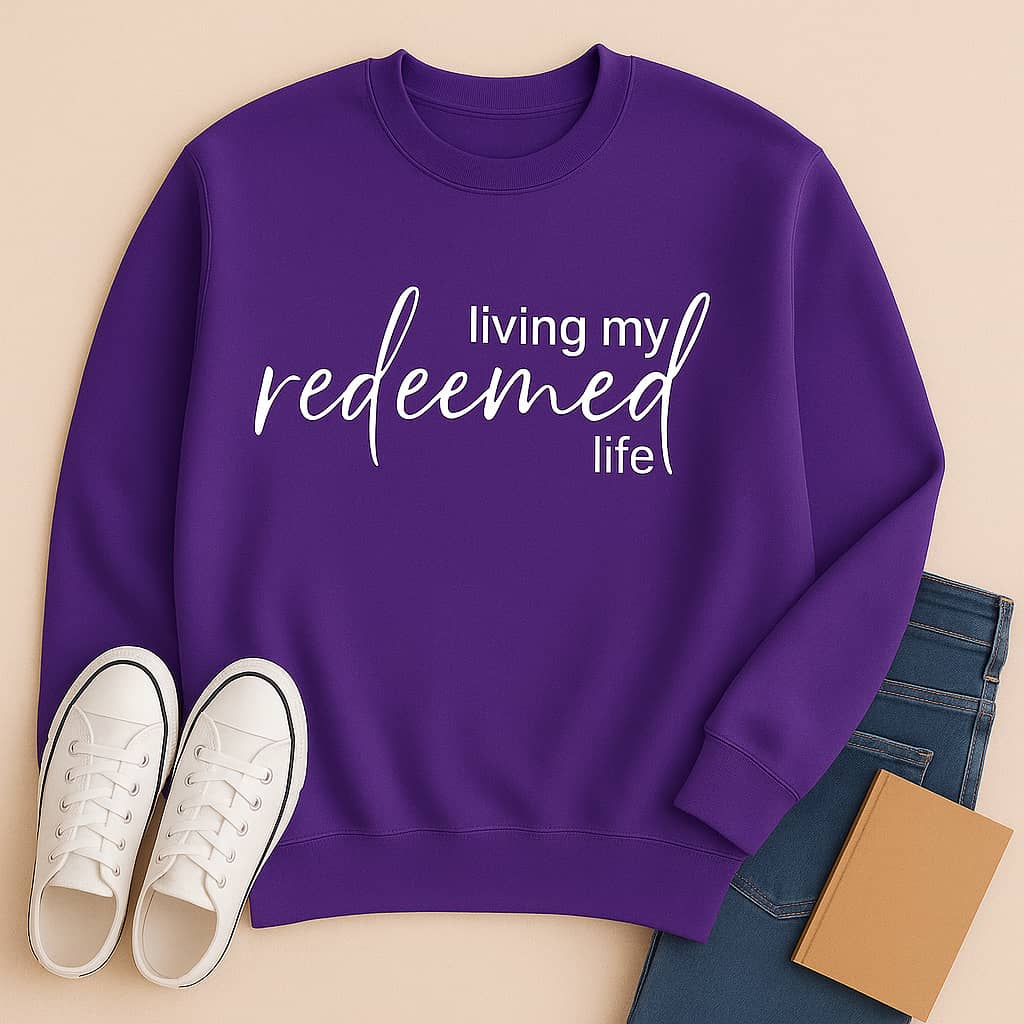 “Living My Redeemed Life” Christian Sweatshirt – Faith-Inspired Comfort & Everyday Encouragement