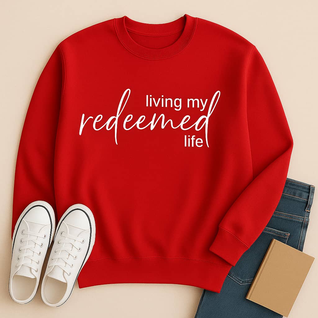 “Living My Redeemed Life” Christian Sweatshirt – Faith-Inspired Comfort & Everyday Encouragement