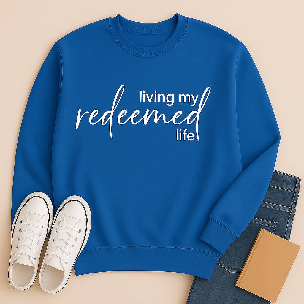 “Living My Redeemed Life” Christian Sweatshirt – Faith-Inspired Comfort & Everyday Encouragement